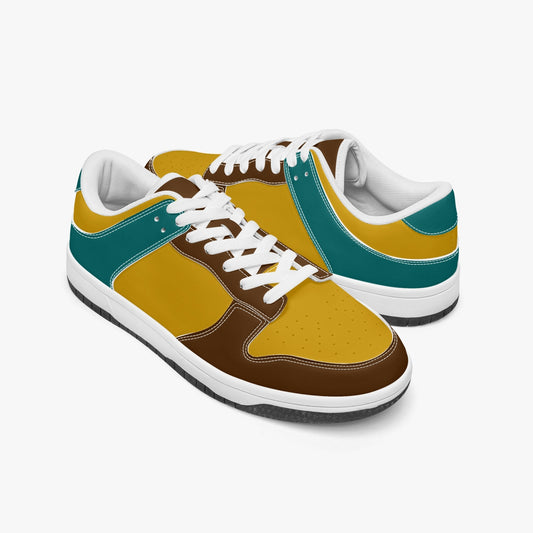 Unique retro color inspired low top leather sneakers. Crafted with premium leather, these sneakers feature teal, yellow and brown color ways for a playful look. Versatile and durable. Shop now for a bold fashion statement!