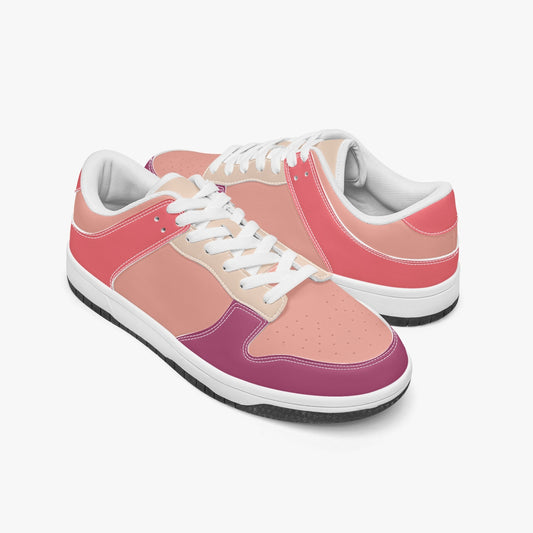 Unique retro color inspired low top leather sneakers. Crafted with premium leather, these sneakers feature a vibrant pink and purple color palette for a playful look. Versatile and durable. Shop now for a bold fashion statement!