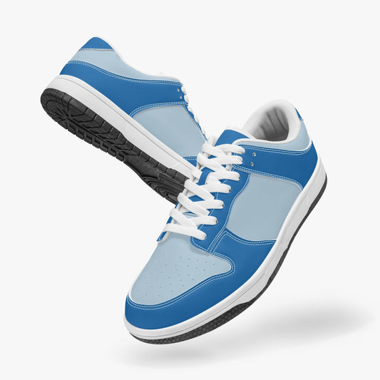 Unique blue and light blue low top leather sneakers. Crafted with premium leather, these sneakers feature a vibrant blue color palette for a playful look. Versatile and durable. Shop now for a bold fashion statement!