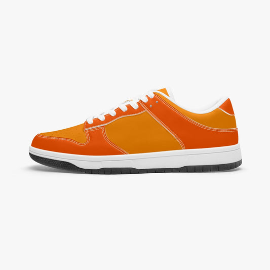 Unique orange low top leather sneakers. Crafted with premium leather, these sneakers feature orange color ways for a playful look. Versatile and durable. Shop now for a bold fashion statement!